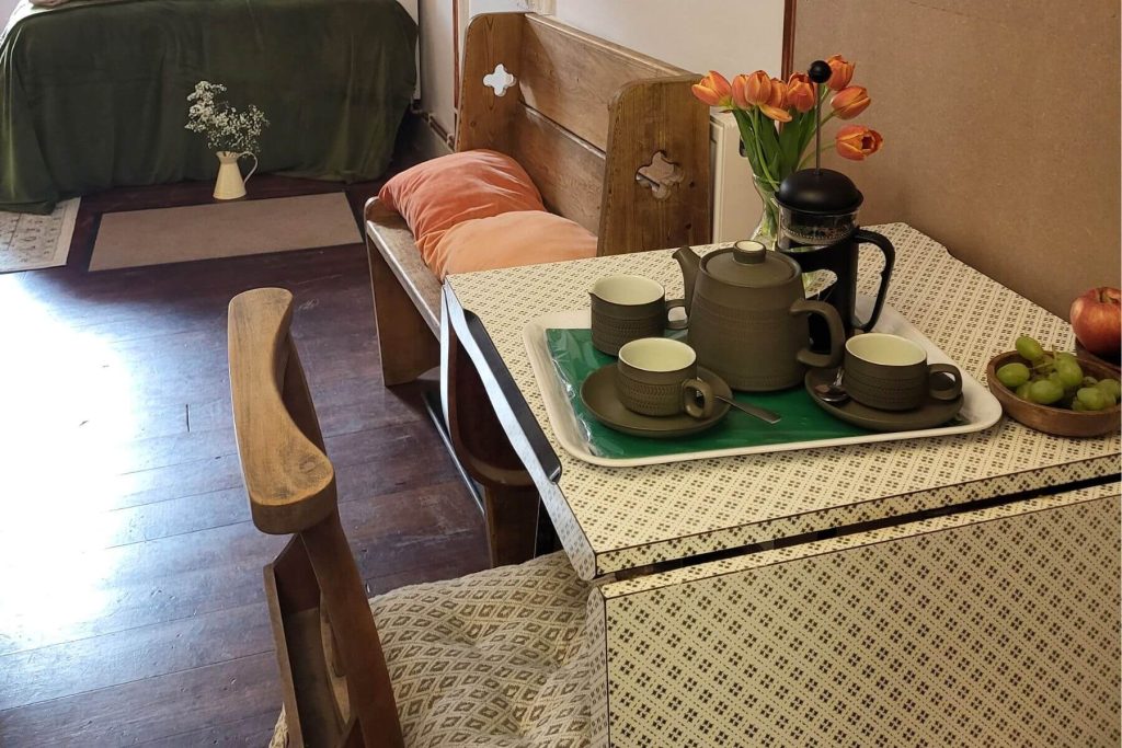 Kitchen table with complimentary tea and coffee at The Old Telephone Exchange